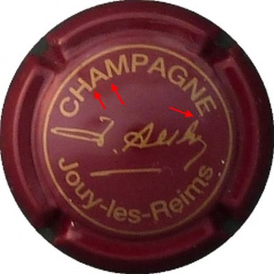 N°05a Bordeaux et or, petites lettres, 3 lettres de champagne se touchant
Photo BENEZETH Louis
