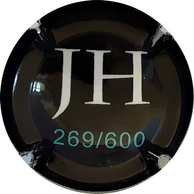 N°28 Verso Croix rock de Johnny Halliday, initiales JH, numérotée 269/600
Photo MH Millot
